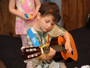 Boy playing Guitar